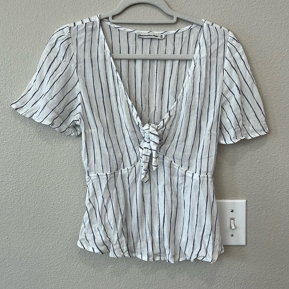 A&F cute flowy crepe peplum top, front tie, white and blue stripe. Size M